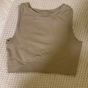 Tan workout tank. Can be worn with or without a sports bra